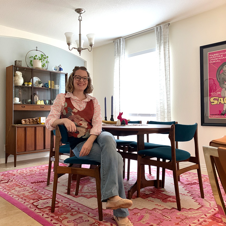 Hopeful adoptive parent Stacey sitting in their home's dining room