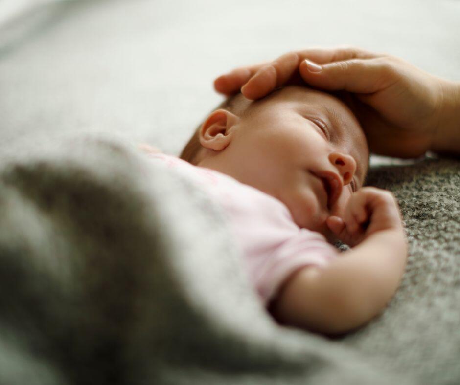 newborn receiving cradle care