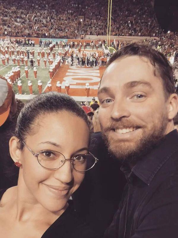 Adoptive parents Dany and Jeremy at at Longhorns football game in Austin
