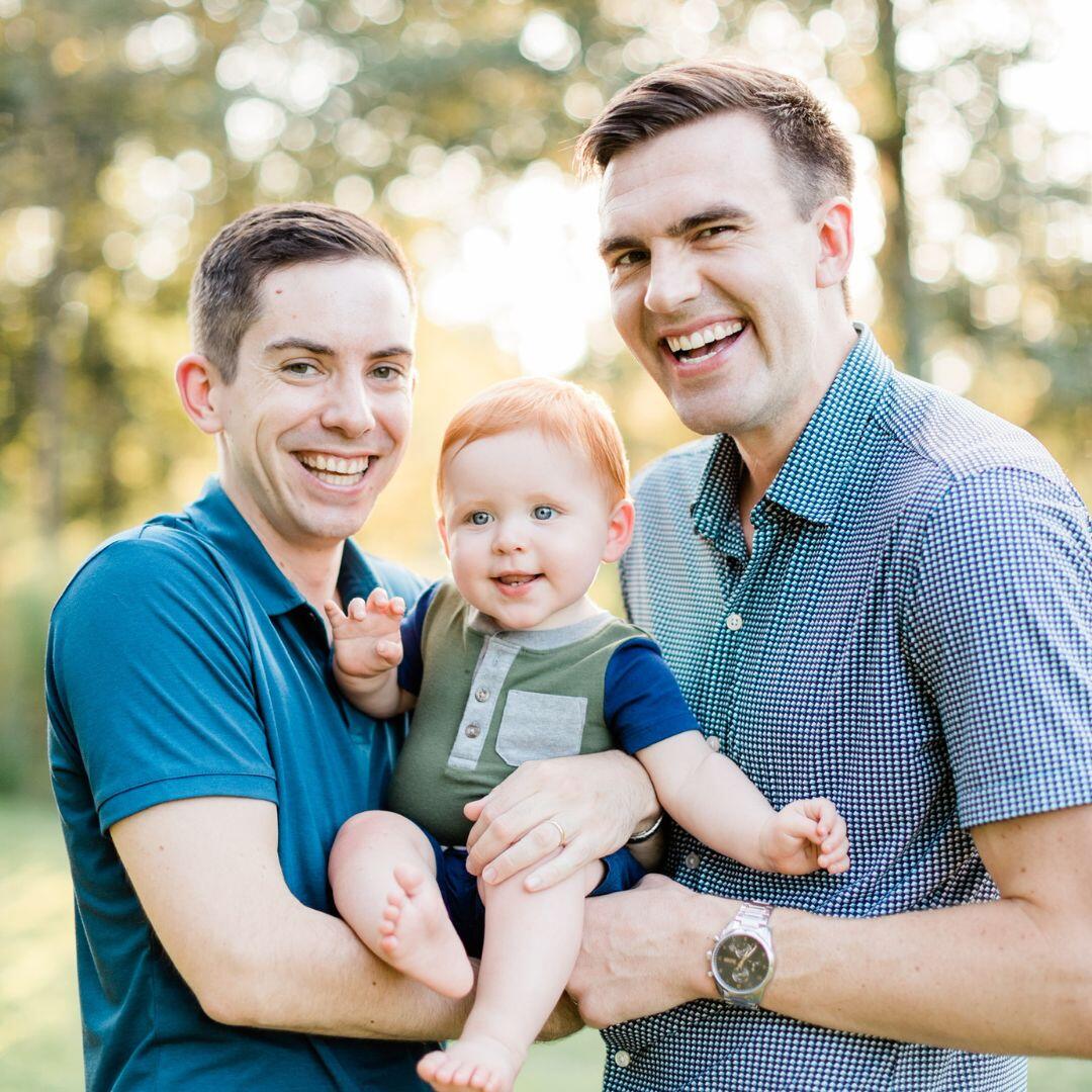 Bo and Neil, Houston parents with their adopted son