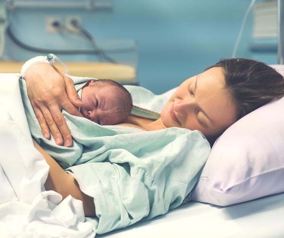 birth mom in hospital after delivering her baby