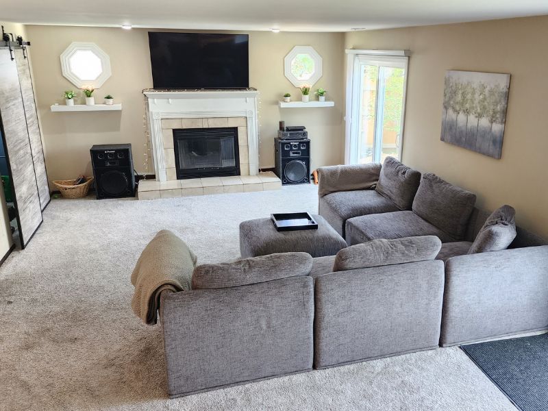 Living room of suburban Chicago home of couple looking to adopt a baby