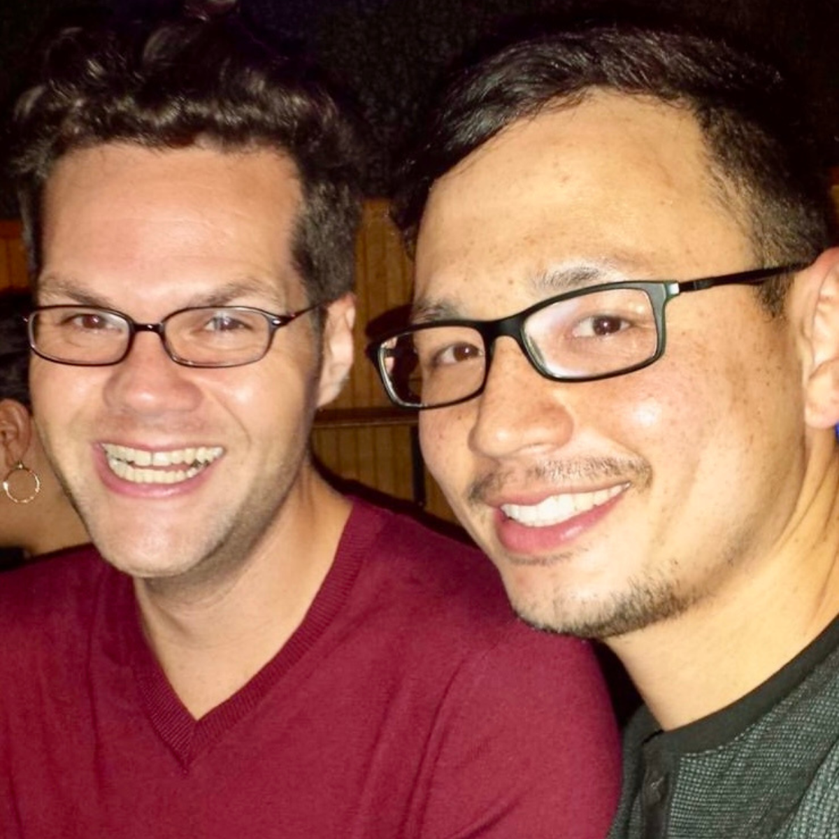 gay dads , both with brown hair and glasses, looking to adopt in houston