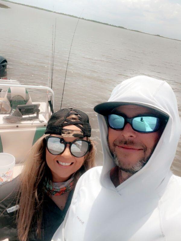 Laci and Ben, a Houston, TX hoping to adopt, on a fishing boat