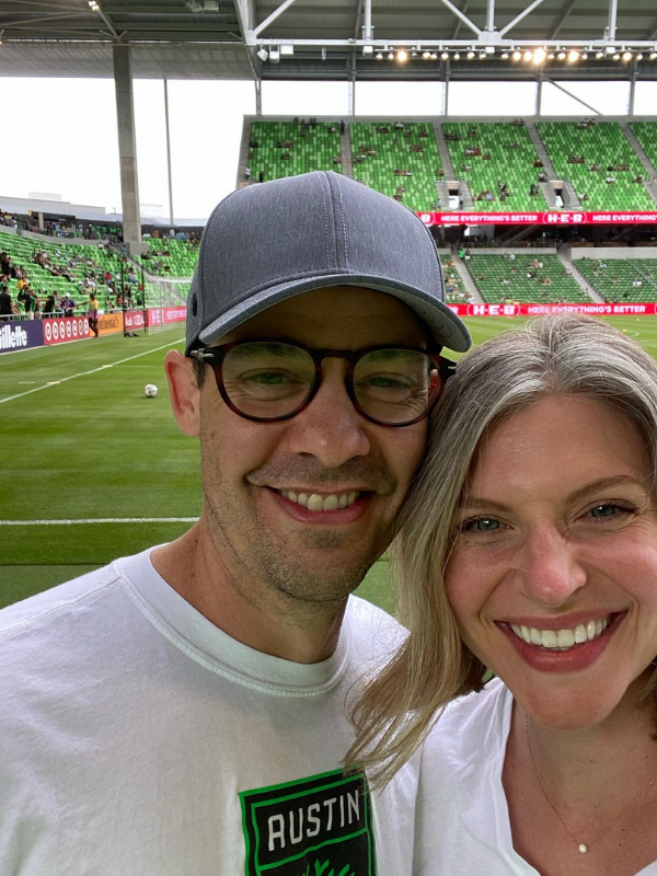 Hopeful adoptive parents Jess and Will at an FC Austin soccer game