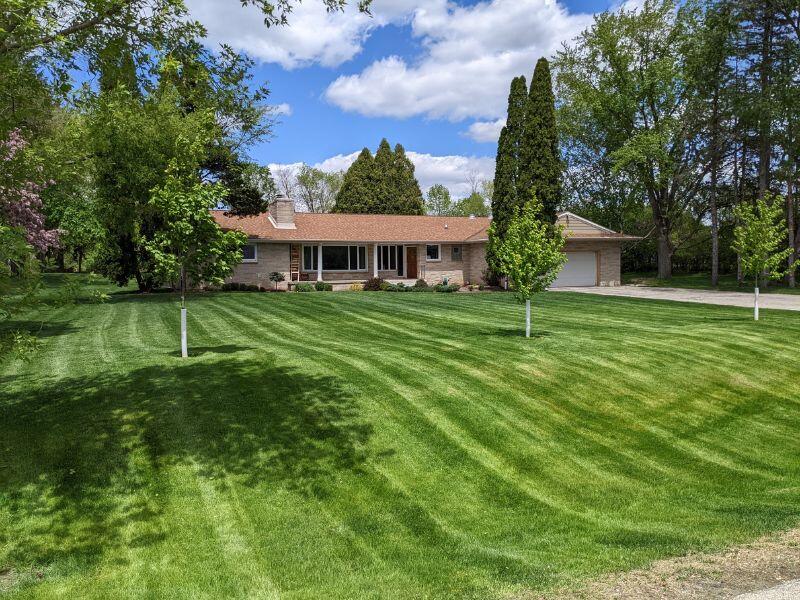 Adoptive family's suburban home with large lawn