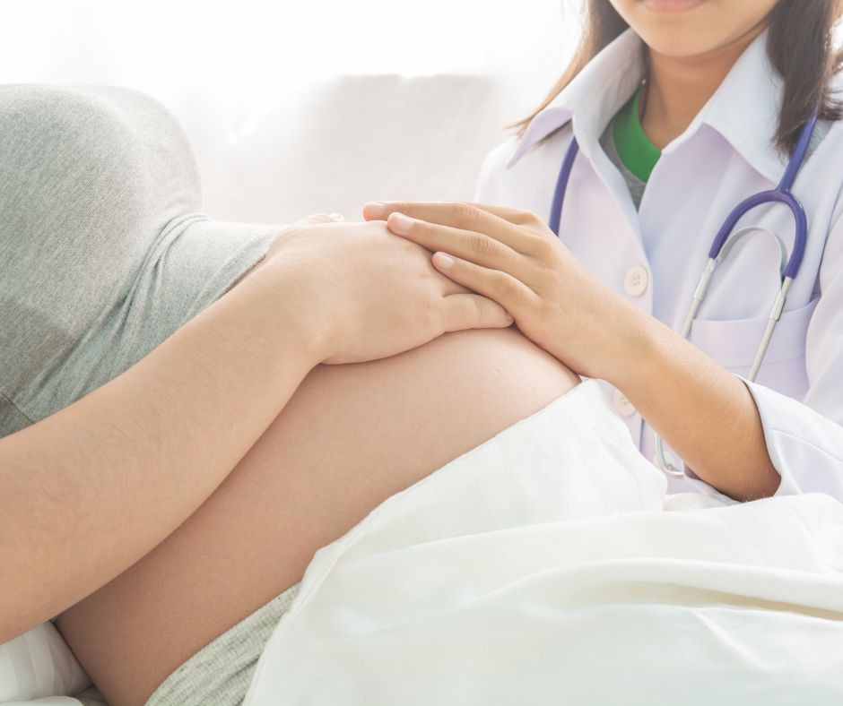 Hospital staff supporting pregnant mom considering adoption