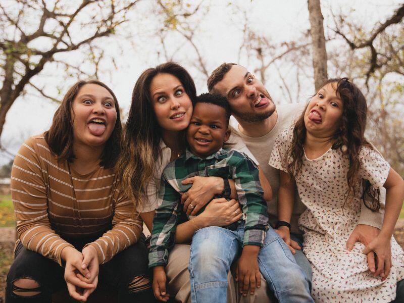 Silly face photo of transracial adoptive family from Texas